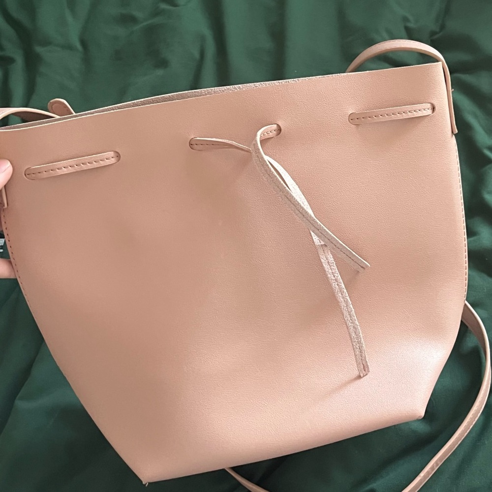 Kayla&Ava bowtie bucket back never used. Entirely vegan leather in dusty pink